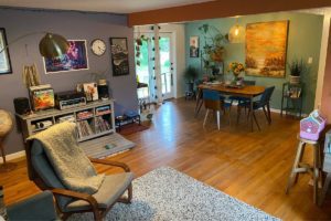 Photo of accent walls on interior paint client house with purple and green walls