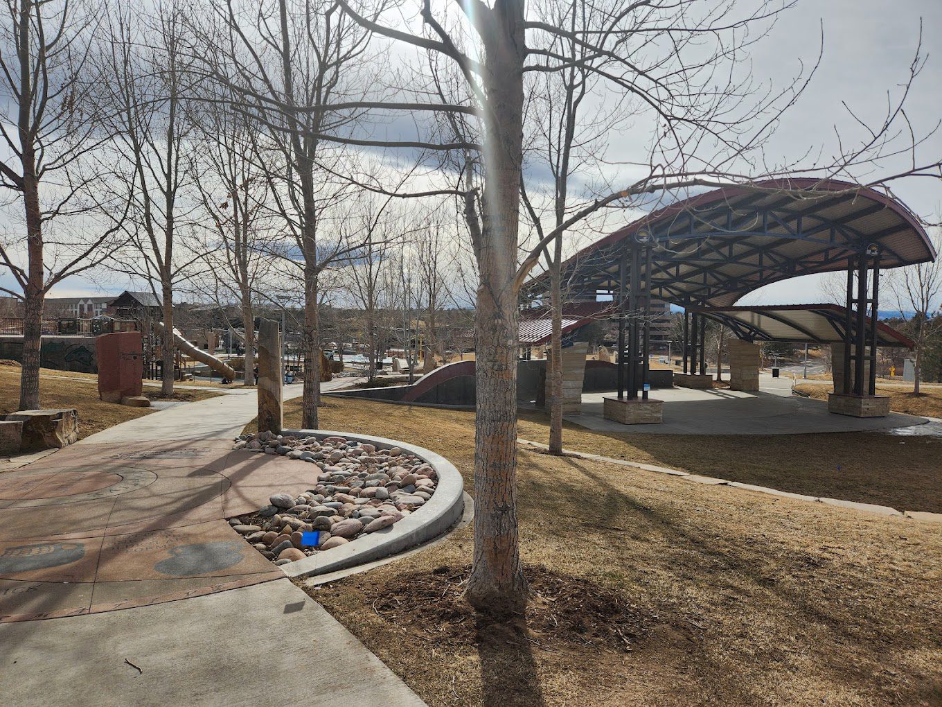 Image of center park in centennial, co with an amphitheater and playground
