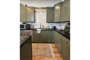 Green painted kitchen cabinets
