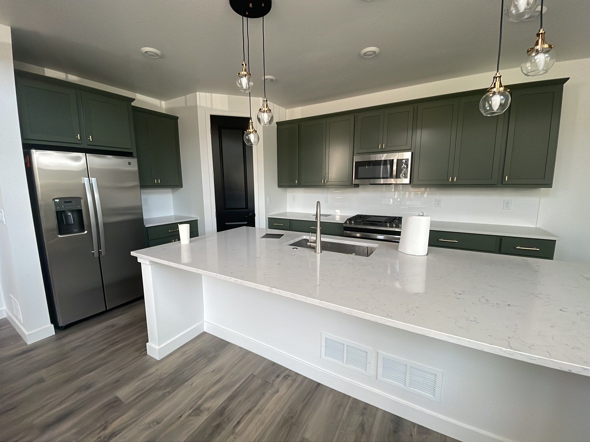 Image of interior cabinets in green 